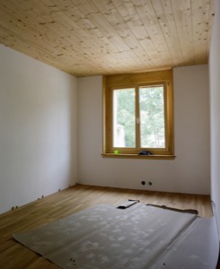 Construction en paille, parquet, Suisse